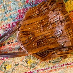 Leather fringe handbag